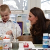 The Duchess of Cambridge and a child from Art Room
